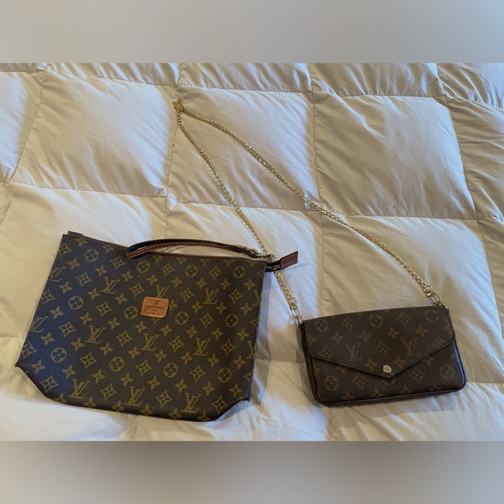 Clutch, wristlet and crossbody purses in brown and black with gold accents.